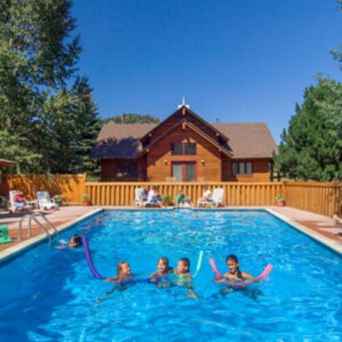 Family enjoying the pool at Rams Horn Village Resort