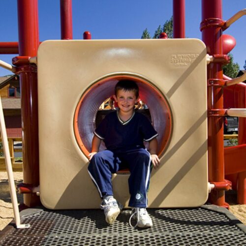 Kid playing at the playground in Rams Horn Village Resort